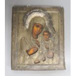 A 19th century Russian 84 zolotnik Icon depicting the Madonna and child, pierced apertures with