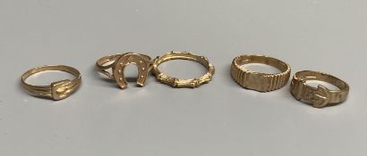 Five assorted modern 9ct gold rings, including two buckle rings and a horseshoe ring,10.7 grams.