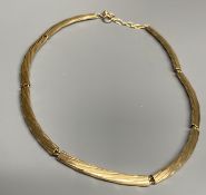 A modern 9ct gold curved link necklet, approx. 38cm,gross 17 grams.