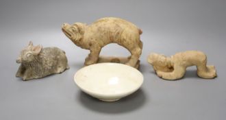 A Chinese Han terracotta model of a standing pig, 17cm long 12cm high, together with two further
