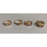 Four assorted modern 9ct gold rings including two claddagh rings,15.1 grams.