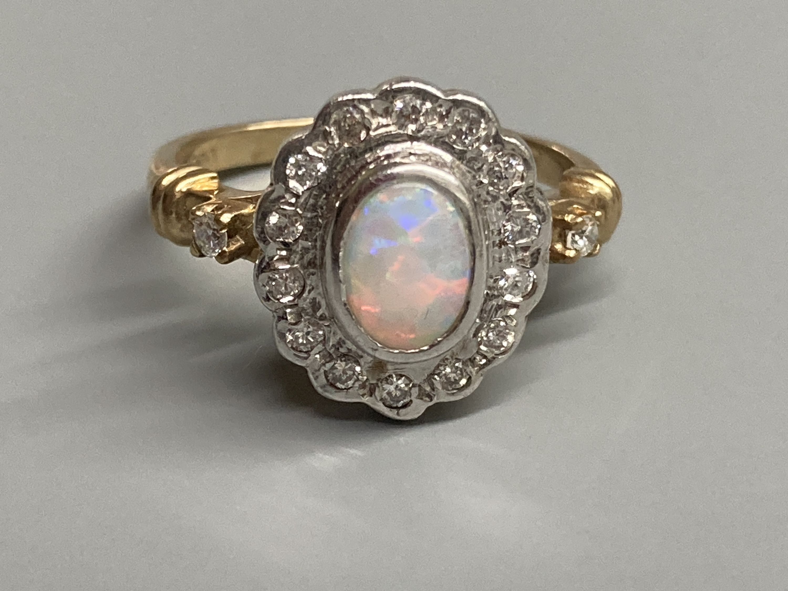 A modern 9ct gold, white opal and diamond chip set cluster ring, with diamond set shoulders, size O, - Image 2 of 3