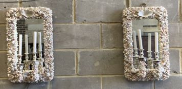 A pair of contemporary shell encrusted two-branch electric girandoles, width 39cm, height 64cm