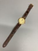 A modern Cartier Vermeil gilt 925 quartz wrist watch, with circular Roman dial and cabochon set