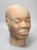 A large decoative terracotta head, 33cm high