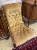 A Victorian walnut buttoned nursing chair, width 58cm, depth 80cm, height 80cm