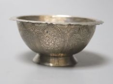 A Chinese small metal bowl, decorated with a floral design, Tang dynasty style, 9cm diameter 4cm