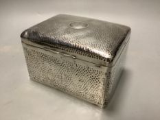 A late Victorian hammered silver cigarette box, London 1898, which 16 cm, gross weight, 32.5
