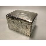 A late Victorian hammered silver cigarette box, London 1898, which 16 cm, gross weight, 32.5