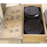 A pair of mid 20th century Japanese black lacquer food boxes and stands