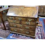 A George II walnut bureau, width 91cm depth 52cm height 97cm