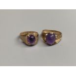 Two modern 9ct gold and cabochon amethyst set dress rings, sizes Q/R & T,gross 11.6 grams.