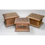 Three Chinese carved hardwood caskets, largest 19 x 15cm 13cm high