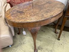 A Queen Anne revival oval walnut centre table, width 118cm, depth 88cm, height 72cm