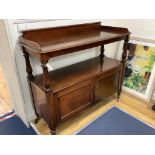 A Victorian mahogany dumb waiter with cupboard below, width 138cm depth 54cm height 118cm