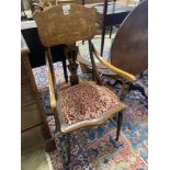 An Art Nouveau marquetry inlaid mahogany and beech elbow chair, width 53cm, depth 54cm, height