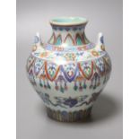 A Chinese doucai vase, 12cm high