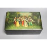 A 19th century Russian lacquer box, decorated with dancers to the cover, and signed lower left, 29 x