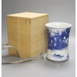 A Chinese blue and white porcelain brush pot, painted with a landscape, 17cm high, in later pine