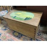A Victorian stripped pine trunk, the top later painted with an airship scene, length 89cm, depth