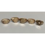 Five assorted modern 9ct gold signet rings including one with diamond chip, largest size M/N,gross