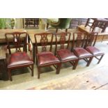 A set of eight Chippendale style mahogany dining chairs (2 arm, 6 single)