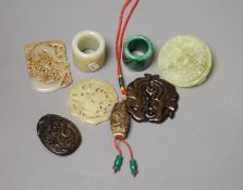 Eight Chinese hardstone pendants or archer's rings