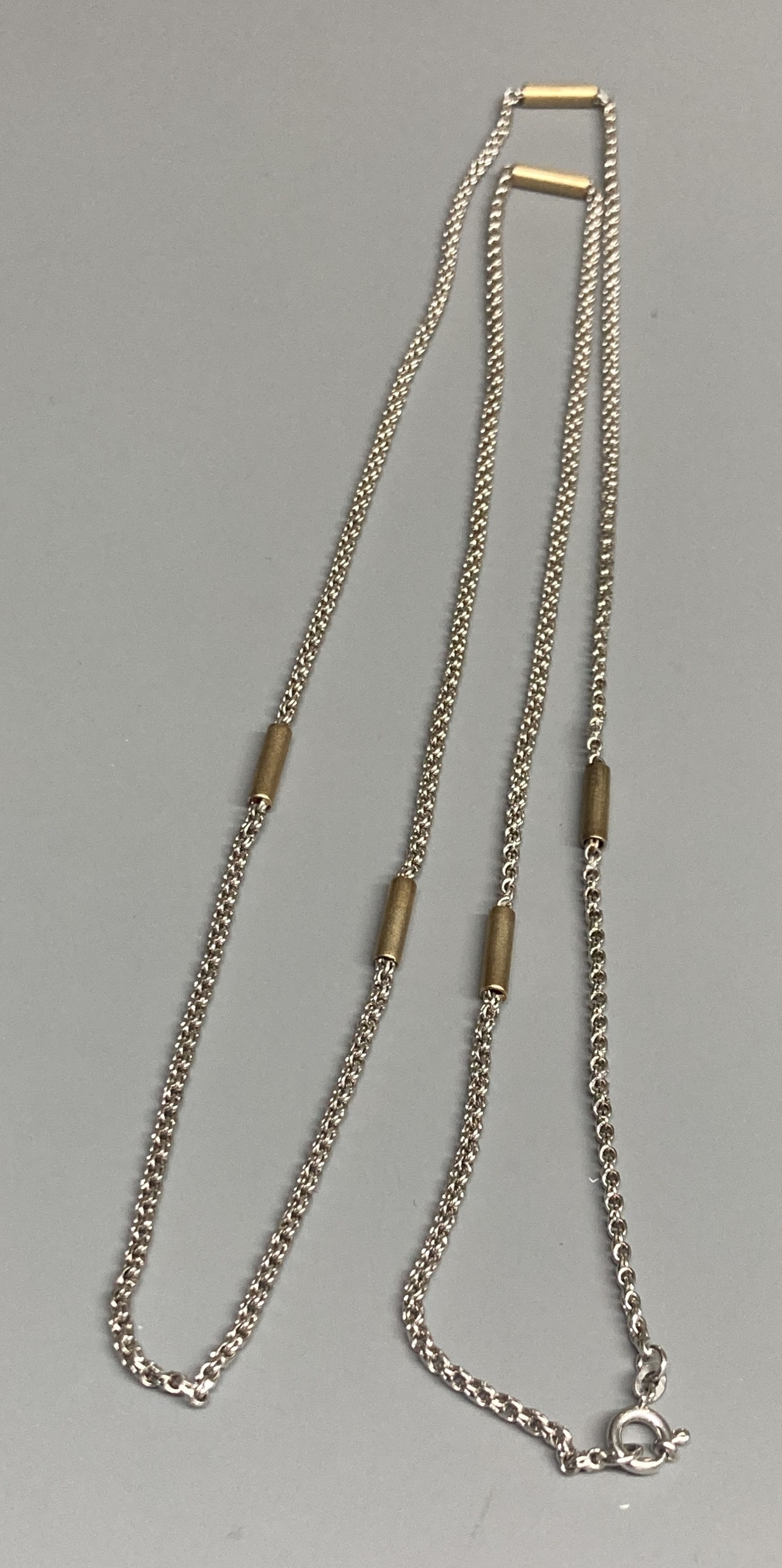 A modern 9ct white gold necklace with yellow gold baton links, 78cm,13.2 grams.