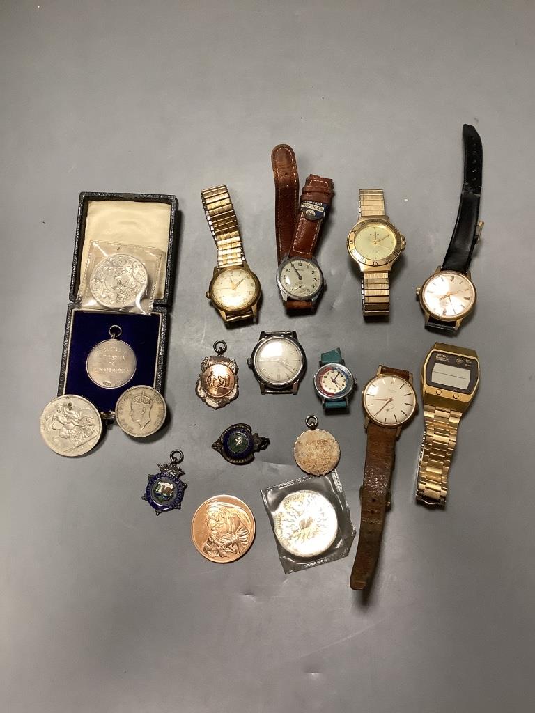 Eight assorted wrist watches including Cortebert and minor coins and medallions.