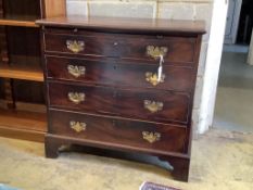 A George III mahogany chest fitted brushing slide, width 87cm, depth 49cm, height 82cm
