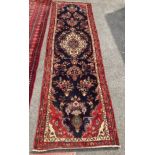 A North West Persian blue ground runner, 300 x 88cm