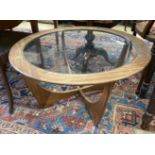 A G Plan circular glass top teak coffee table, diameter 84cm, height 45cm