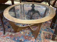 A G Plan circular glass top teak coffee table, diameter 84cm, height 45cm