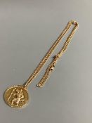 A 9ct gold St. Christopher pendant on a 375 chain, gross 11.8 grams.