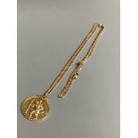 A 9ct gold St. Christopher pendant on a 375 chain, gross 11.8 grams.