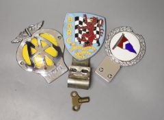 A British Automobile Racing Club car badge, an AA badge and one other