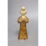 A standing pottery figure of an aristocratic Chinese lady, rare marbled clay, Tang dynasty or later,