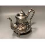 A Victorian embossed silver coffee pot, by George Ivory, London 1857 height 18.2 cmgross 24.5