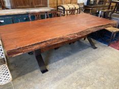 A South African Camelthorn hardwood dining table with a metal x-frame base, length 256cm, width