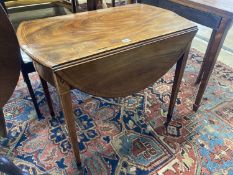 A George III rosewood banded and inlaid mahogany oval Pembroke table, width 79cm depth 49cm,
