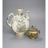 A Chinese famille rose wine ewer, 26cm high and a white metal mounted porcelain jar, 11cm high