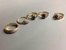 An 18ct gold, sapphire and diamond ring, gross 3.2 grams and four 9ct gold rings, two gem-set, gross