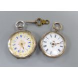 Two engraved silver open face pocket watches,one keywind with white enamelled Roman dial, blue