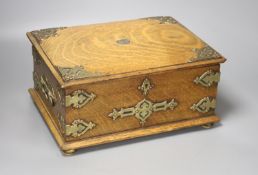 An oak games compendium with plated mounts and contents, 14 x 30cm
