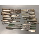 Four George IV silver handled table knives and four similar desert knives and a quantity of silver
