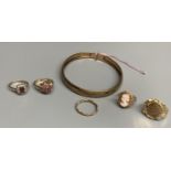 Four assorted modern 9ct gold and gem set rings and a 375 bangle, gross 18 grams and a 585 ring,