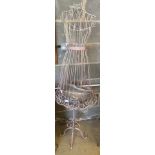 A wirework dressmakers dummy, height 155cm