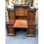 A late Victorian mahogany kneehole desk with fall front, width 151cm, depth 74cm, height 174cm