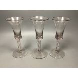 A trio of George III style cotton twist stemmed glasses