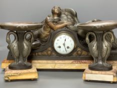 A large Art Deco patinated spelter and marble figural clock garniture, signed P. Seca, longest piece